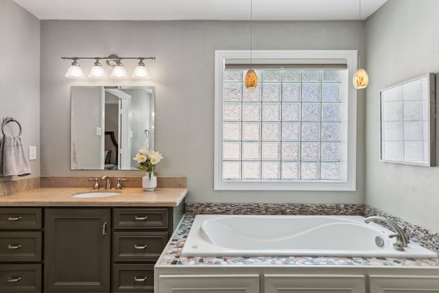 4406 Cobblers Ln, Dallas, TX 75287 - full bath with vanity and a garden tub