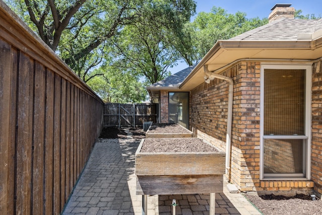 4406 Cobblers Ln, Dallas, TX 75287 - view of patio / terrace featuring a gate