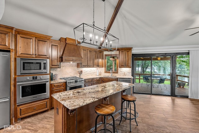 1863 Glen Cove Dr, Benton, LA 71006 - kitchen with stainless steel appliances, premium range hood, decorative backsplash, light stone counters, and brown cabinets