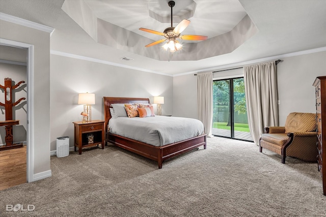 1863 Glen Cove Dr, Benton, LA 71006 - bedroom with access to outside, carpet floors, a raised ceiling, ornamental molding, and baseboards
