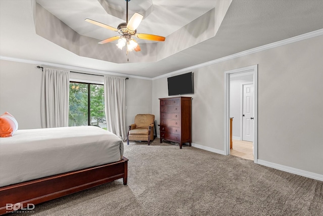 1863 Glen Cove Dr, Benton, LA 71006 - carpeted bedroom featuring crown molding, a raised ceiling, ceiling fan, and baseboards