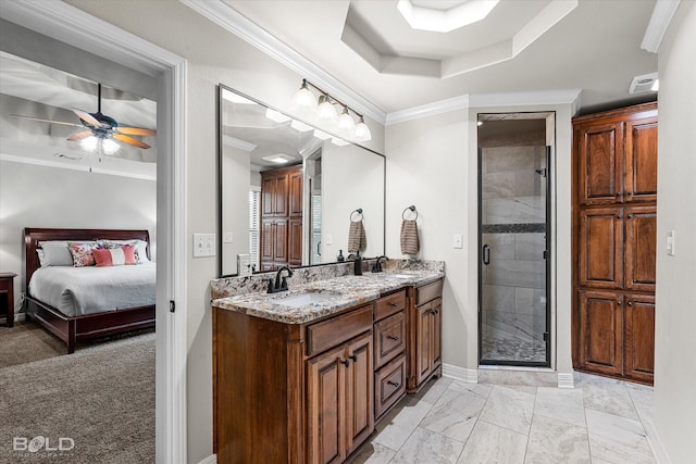 1863 Glen Cove Dr, Benton, LA 71006 - ensuite bathroom featuring double vanity, ceiling fan, a shower stall, baseboards, and crown molding