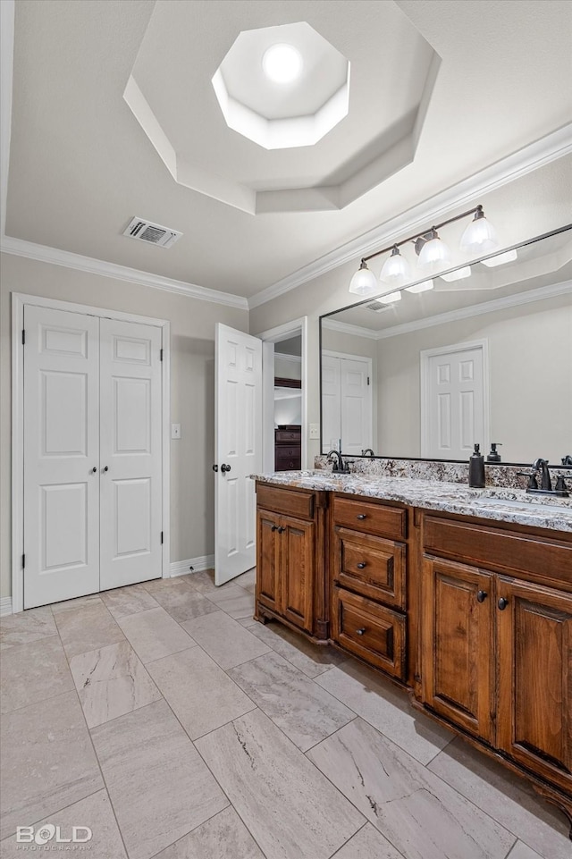 1863 Glen Cove Dr, Benton, LA 71006 - full bath featuring a tray ceiling, double vanity, ornamental molding, and marble finish floors