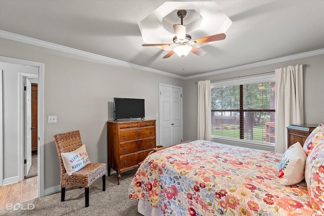 1863 Glen Cove Dr, Benton, LA 71006 - carpeted bedroom with crown molding, a ceiling fan, and baseboards
