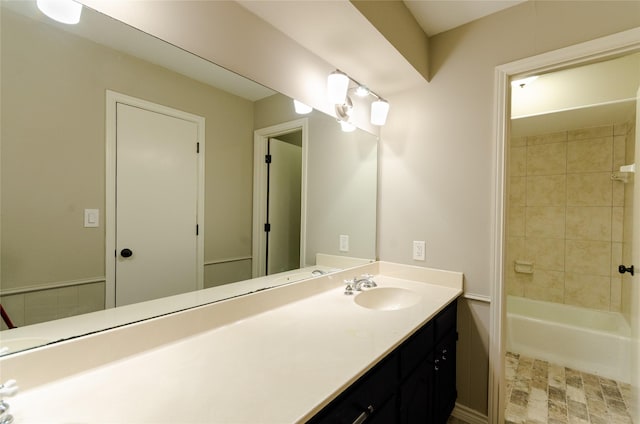 3824 Wagonwheel Ct, Plano, TX 75023 - full bath with vanity, bathing tub / shower combination, and baseboards