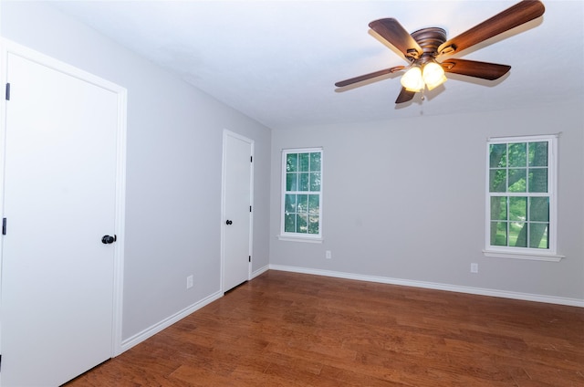 3824 Wagonwheel Ct, Plano, TX 75023 - spare room featuring healthy amount of natural light, wood finished floors, and baseboards