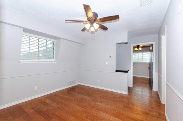 3824 Wagonwheel Ct, Plano, TX 75023 - spare room featuring a ceiling fan and wood finished floors