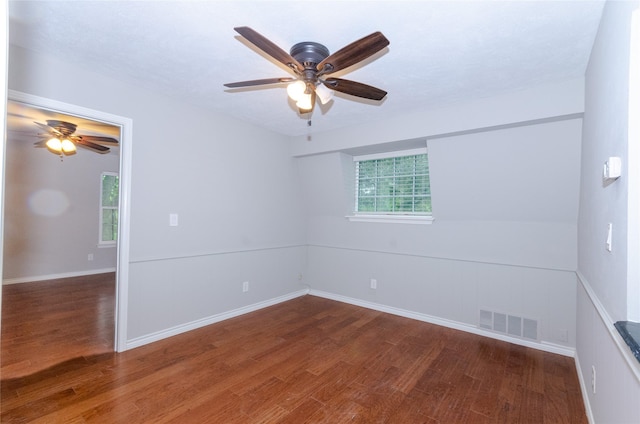 3824 Wagonwheel Ct, Plano, TX 75023 - empty room with a ceiling fan, wood finished floors, and baseboards