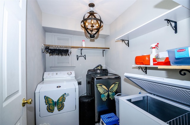 3824 Wagonwheel Ct, Plano, TX 75023 - washroom with washer and clothes dryer and a chandelier