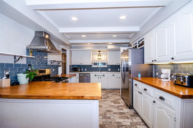 3824 Wagonwheel Ct, Plano, TX 75023 - kitchen featuring wall chimney range hood, stainless steel appliances, a sink, wood counters, and ornamental molding