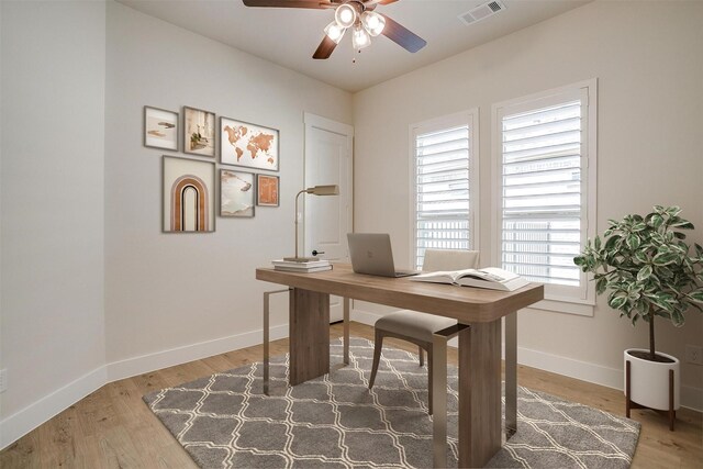 6145 Lucia Dr, Fort Worth, TX 76123 - office area with baseboards, a ceiling fan, and wood finished floors