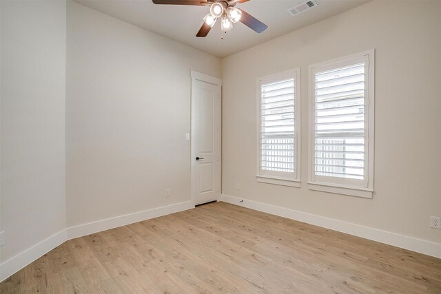 6145 Lucia Dr, Fort Worth, TX 76123 - empty room with light wood-style flooring, ceiling fan, and baseboards