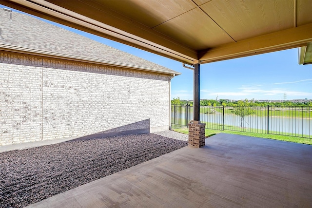 6145 Lucia Dr, Fort Worth, TX 76123 - view of patio / terrace featuring a water view