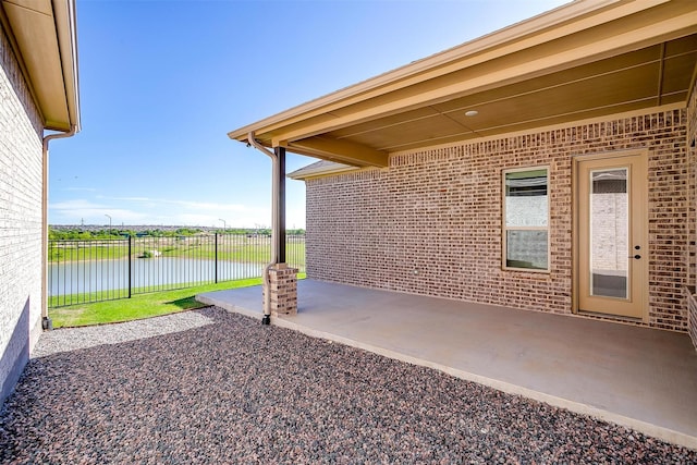 6145 Lucia Dr, Fort Worth, TX 76123 - view of patio featuring a water view