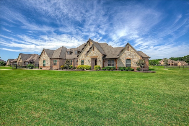 552 Horseshoe Bnd, Royse City, TX 75189 - french country home with stone siding, brick siding, and a shingled roof