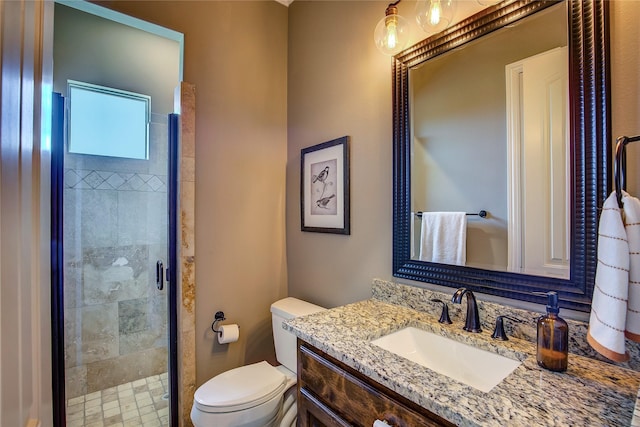552 Horseshoe Bnd, Royse City, TX 75189 - bathroom featuring vanity, toilet, and a stall shower