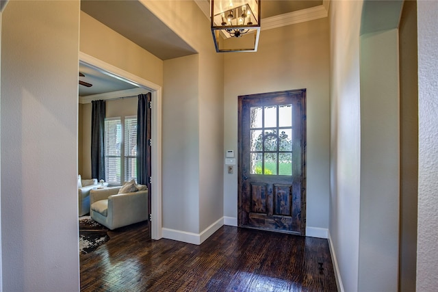 552 Horseshoe Bnd, Royse City, TX 75189 - entrance foyer featuring crown molding, dark wood-style floors, a chandelier, and baseboards