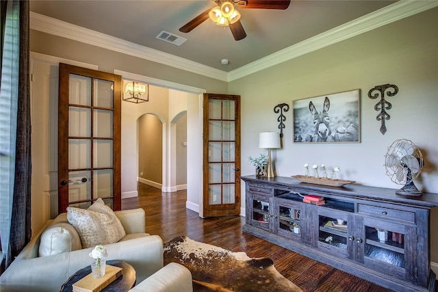 552 Horseshoe Bnd, Royse City, TX 75189 - living area featuring arched walkways, a ceiling fan, dark wood-type flooring, ornamental molding, and baseboards