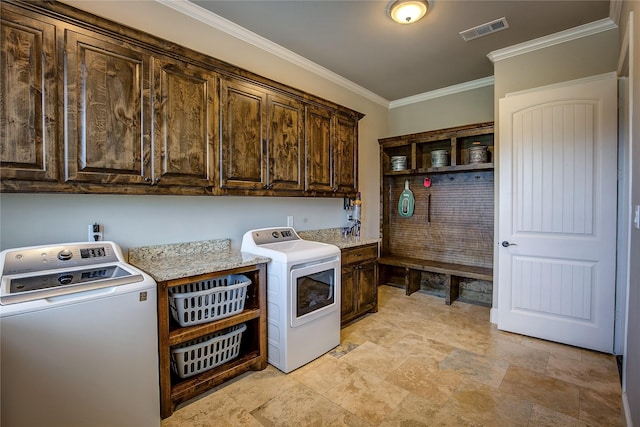 552 Horseshoe Bnd, Royse City, TX 75189 - laundry area with cabinet space, crown molding, washer and clothes dryer, and light stone finish flooring