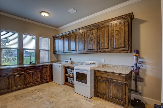 552 Horseshoe Bnd, Royse City, TX 75189 - laundry room featuring cabinet space, separate washer and dryer, and ornamental molding