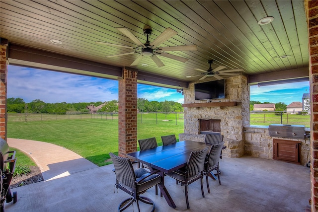 552 Horseshoe Bnd, Royse City, TX 75189 - view of patio / terrace featuring outdoor dining area, an outdoor stone fireplace, and ceiling fan