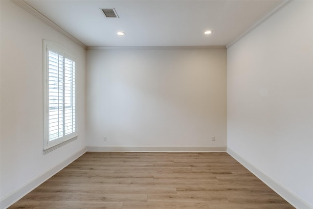 7904 Fair Oaks Ave, Dallas, TX 75231 - empty room with crown molding, healthy amount of natural light, light wood-style floors, recessed lighting, and baseboards