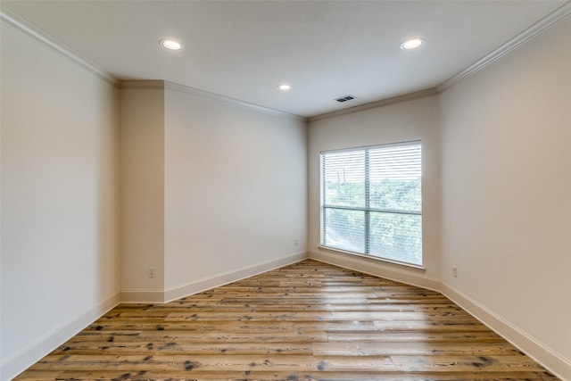 7904 Fair Oaks Ave, Dallas, TX 75231 - spare room featuring recessed lighting, ornamental molding, wood finished floors, and baseboards