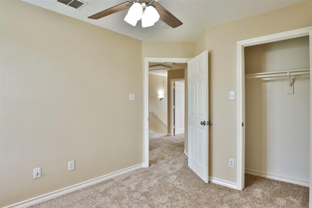 7703 Stanley, Joshua, TX 76058 - unfurnished bedroom with light colored carpet, a closet, a ceiling fan, and baseboards