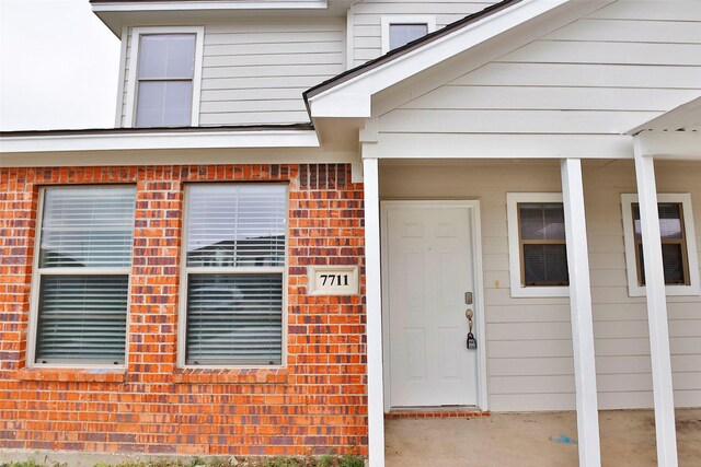 7703 Stanley, Joshua, TX 76058 - view of exterior entry with brick siding