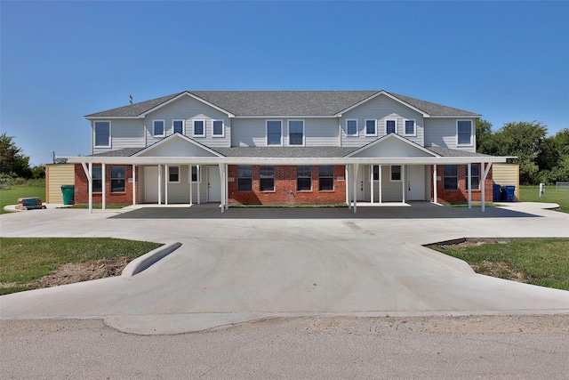 7703 Stanley, Joshua, TX 76058 - multi unit property featuring covered porch, brick siding, and curved driveway