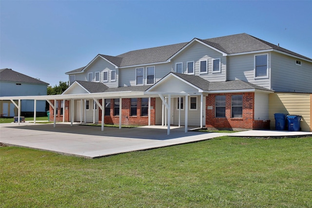 7703 Stanley, Joshua, TX 76058 - back of house with brick siding, a carport, and roof with shingles