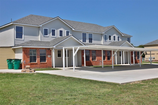 7703 Stanley, Joshua, TX 76058 - rear view of house featuring brick siding, roof with shingles, and a yard