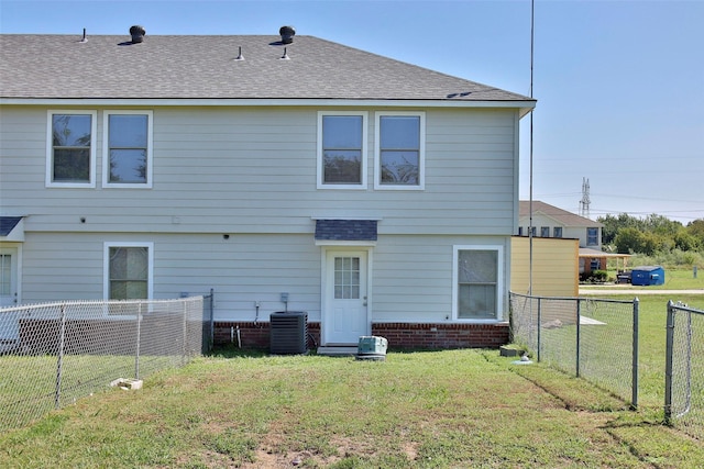7703 Stanley, Joshua, TX 76058 - back of house with cooling unit and roof with shingles