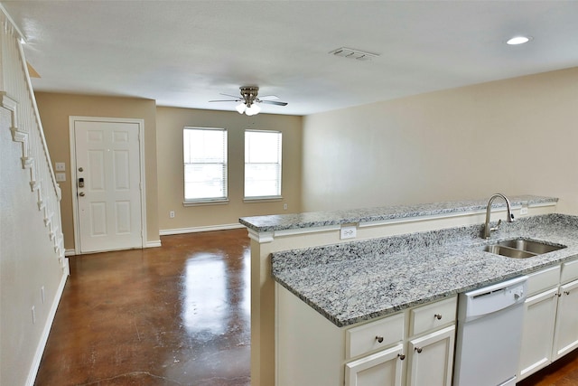 7703 Stanley, Joshua, TX 76058 - kitchen featuring dishwasher, a sink, ceiling fan, light stone countertops, and baseboards