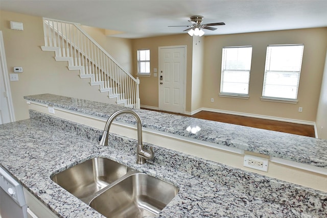 7703 Stanley, Joshua, TX 76058 - foyer featuring ceiling fan, stairs, and baseboards