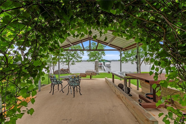 250 Whispering Oaks, Payne Springs, TX 75156 - view of patio featuring a water view, a boat dock, and area for grilling