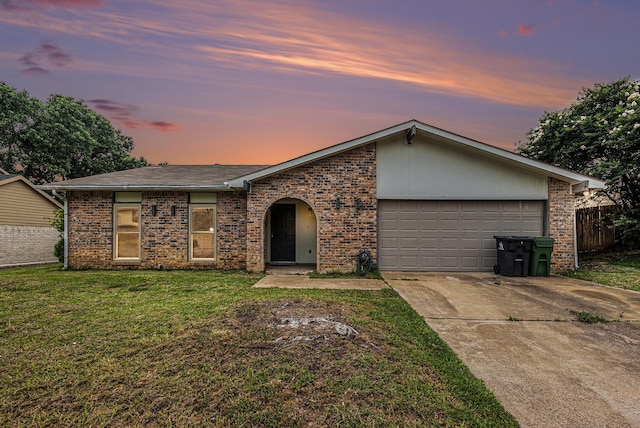 7107 Greenspring Dr, Arlington, TX 76016 - view of front facade with driveway, a garage, and brick siding