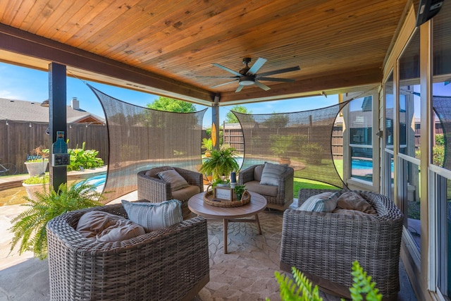 306 Hardeman Blvd, Justin, TX 76247 - fenced backyard with an outdoor hangout area, a ceiling fan, and a patio
