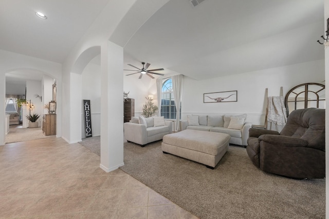 306 Hardeman Blvd, Justin, TX 76247 - living room featuring ceiling fan, arched walkways, and light tile patterned floors