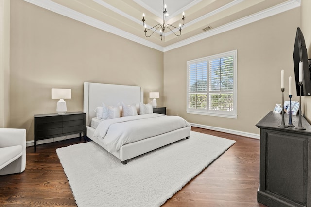 406 Wyndemere Blvd, Heath, TX 75032 - bedroom featuring a chandelier, ornamental molding, a raised ceiling, dark wood-style floors, and baseboards