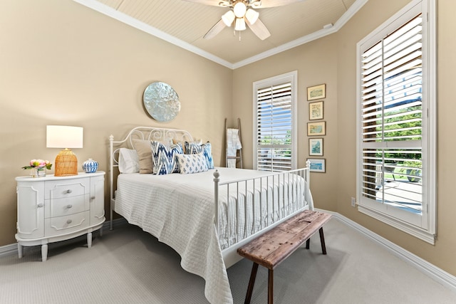406 Wyndemere Blvd, Heath, TX 75032 - carpeted bedroom featuring baseboards, multiple windows, ornamental molding, and a ceiling fan
