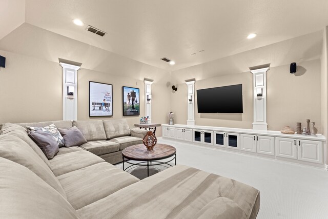 406 Wyndemere Blvd, Heath, TX 75032 - carpeted living area with decorative columns and recessed lighting