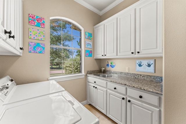 406 Wyndemere Blvd, Heath, TX 75032 - laundry area with separate washer and dryer, cabinet space, crown molding, and baseboards
