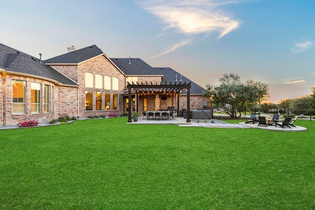 406 Wyndemere Blvd, Heath, TX 75032 - back of house at dusk with a pergola, a patio area, brick siding, a shingled roof, and a yard