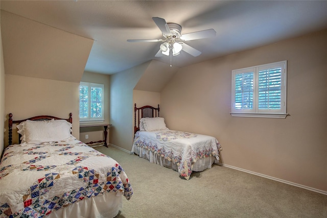 221 County Road 1946, Emory, TX 75440 - carpeted bedroom featuring multiple windows, baseboards, ceiling fan, and lofted ceiling