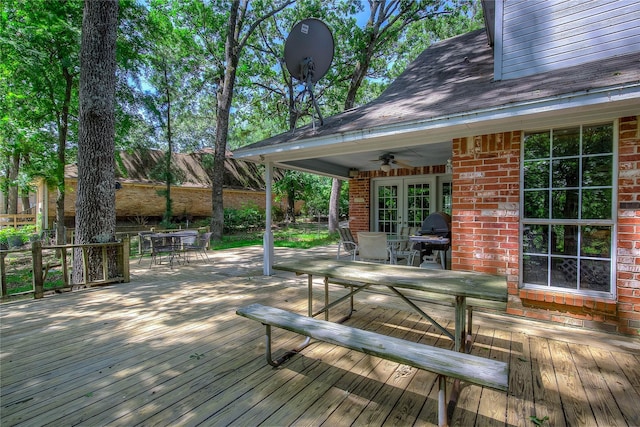 221 County Road 1946, Emory, TX 75440 - deck with outdoor dining space, a ceiling fan, french doors, and grilling area