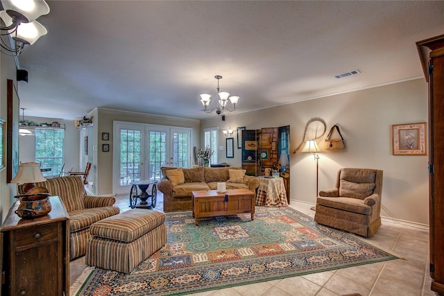 221 County Road 1946, Emory, TX 75440 - living room featuring a chandelier, crown molding, baseboards, and light tile patterned floors