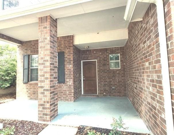 1207 Goldeneye, Aubrey, TX 76227 - entrance to property with brick siding