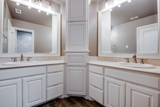 3317 S Riley Ct, Hurst, TX 76054 - full bathroom with vanity and wood finished floors