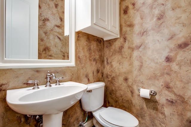 3317 S Riley Ct, Hurst, TX 76054 - bathroom with a sink and toilet